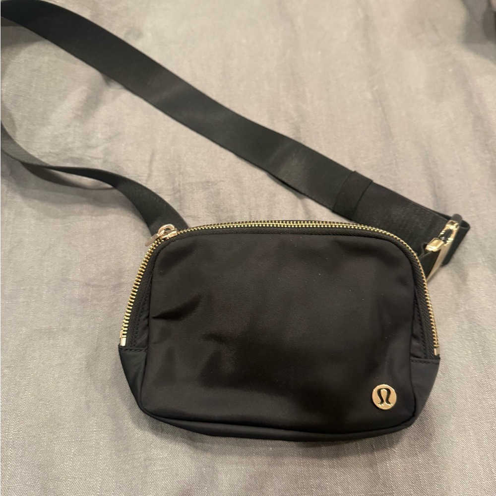 Lululemon Athletica Black Belt Bag with Gold Accents